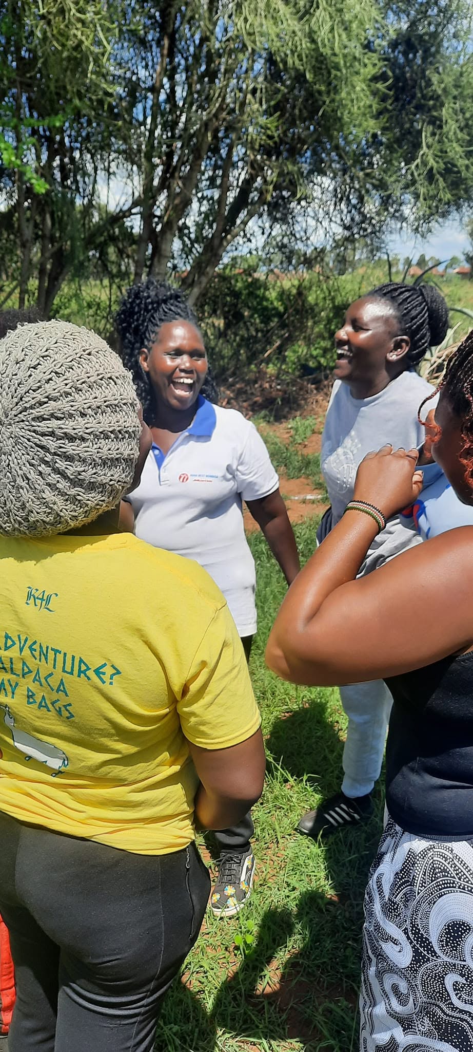 Team members participating in an outdoor group activity
